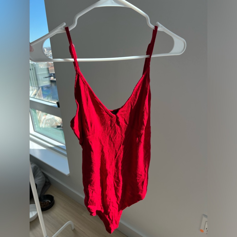 Red bodysuit, very sexy
